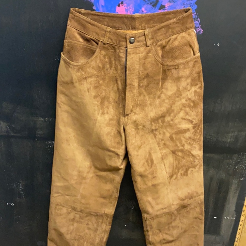 Brown leather pants.